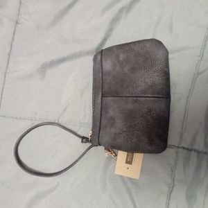 NWT Wilsons Leather Wristlet. Perfect For FALL!